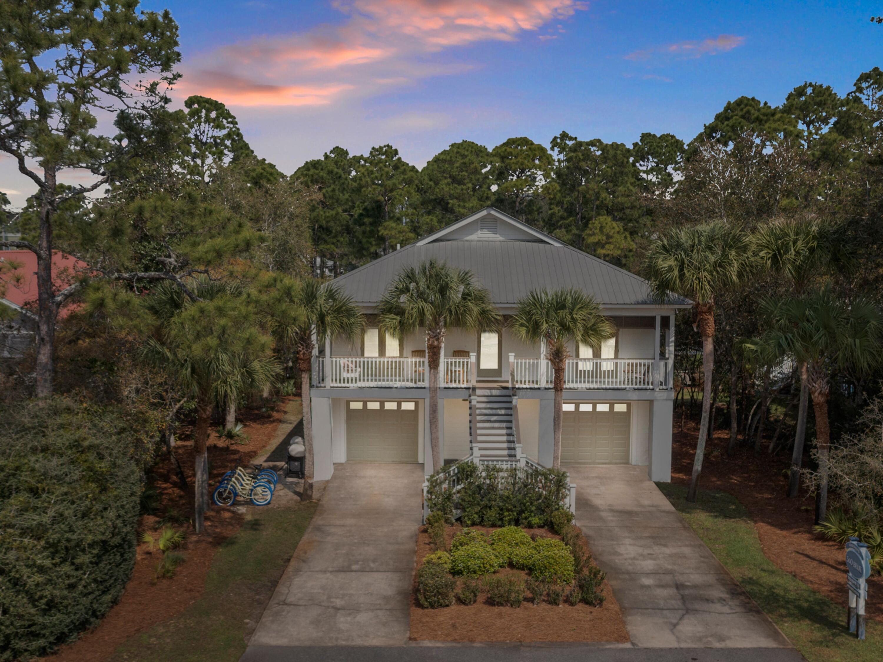 499 Lakeview Drive Santa Rosa Beach, FL 32459 - Photo 47 of 52 a front view of a house with a yard