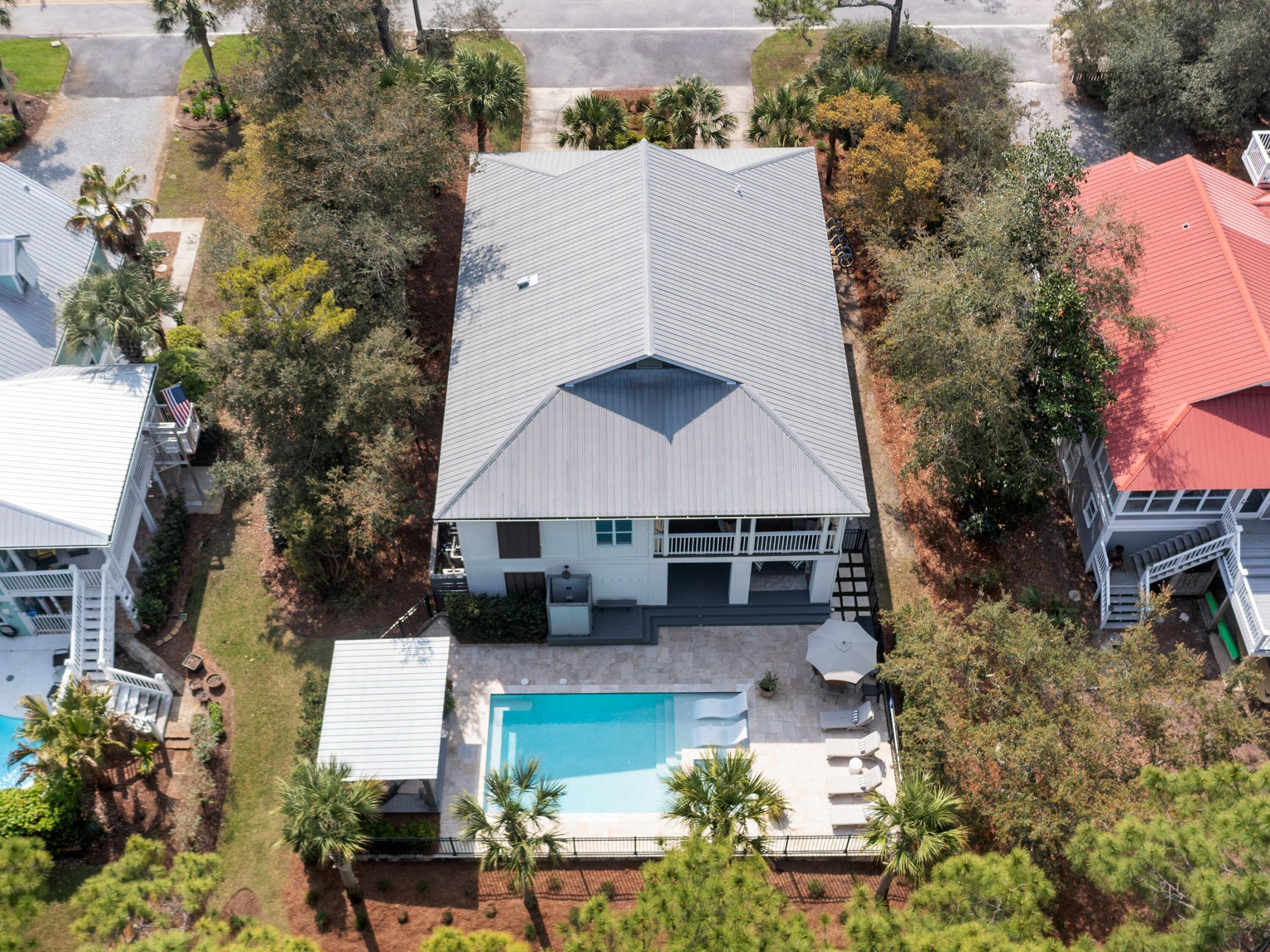 499 Lakeview Drive Santa Rosa Beach, FL 32459 - Photo 49 of 52 a aerial view of a house with a yard and potted plants