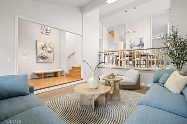 a living room with furniture and a table