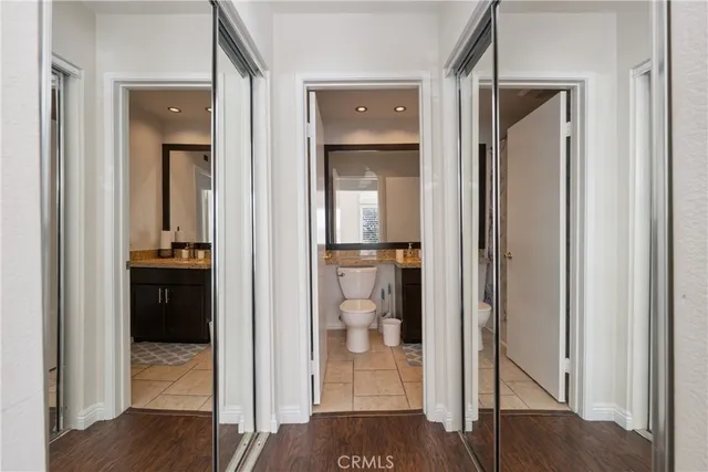 a view of a bedroom from a hallway