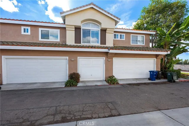 a front view of a house with yard