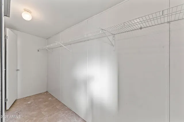 a bathroom with a bathtub and a toilet