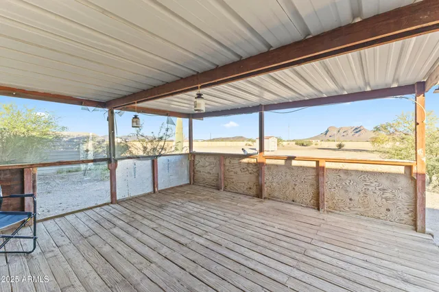 a view of storage and utility room with washer and dryer