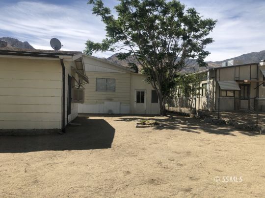 3713 Goat Ranch Road Mountain Mesa, CA 93240 - Photo 31 of 43 a view of house with backyard and trees