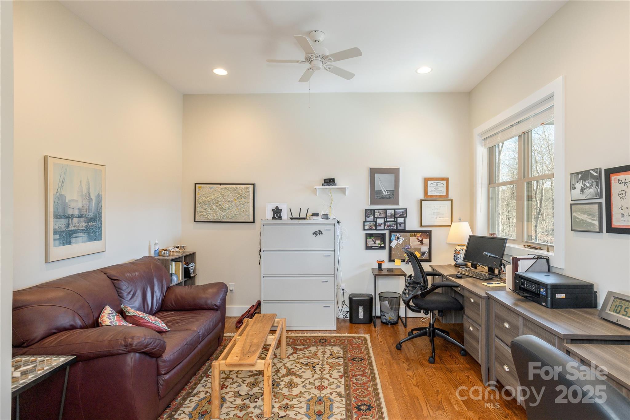 69 Pepperbush Road Brevard, NC 28712 - Photo 16 of 34 a living room with furniture and a window