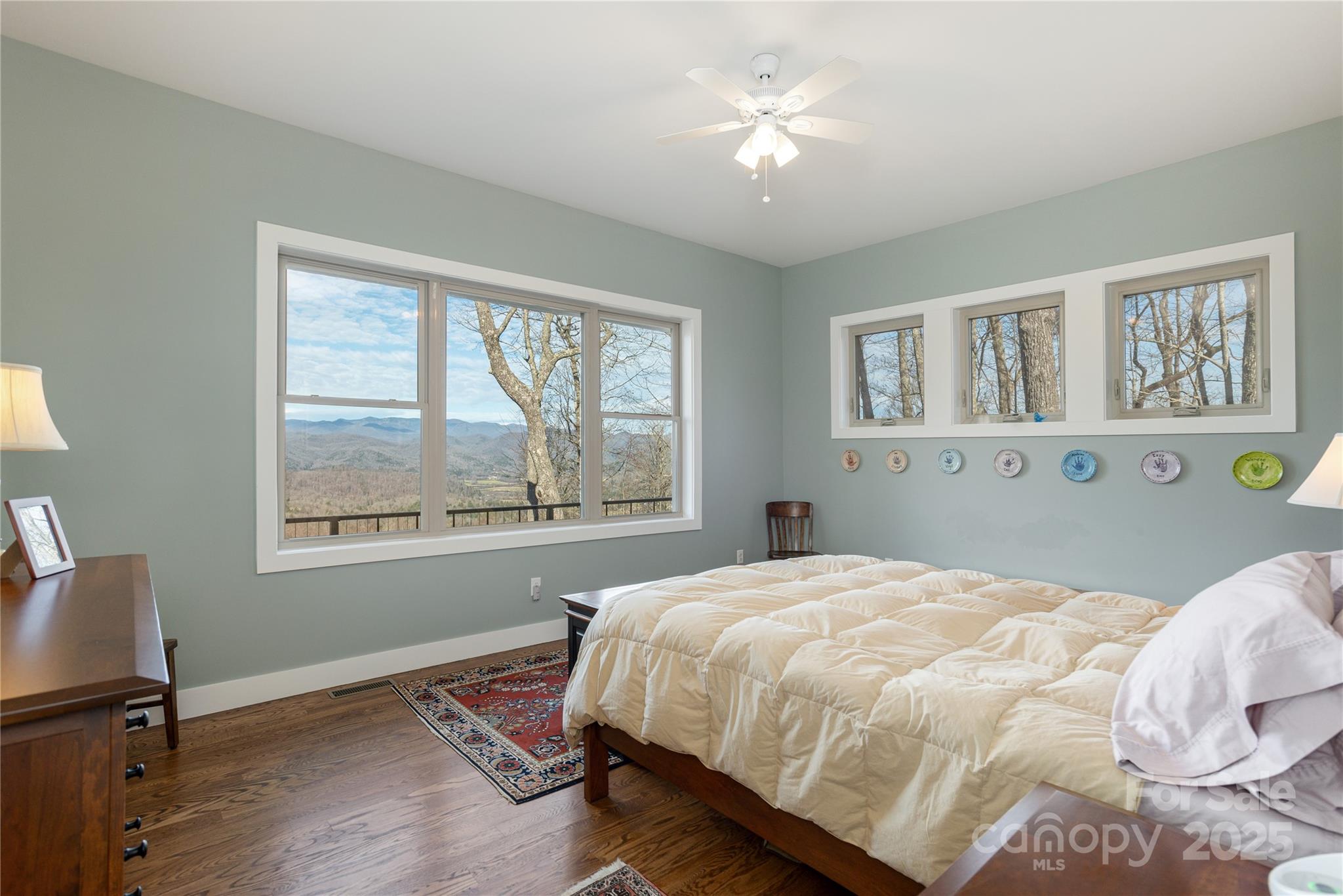 69 Pepperbush Road Brevard, NC 28712 - Photo 19 of 34 a bedroom with a bed dresser and a window