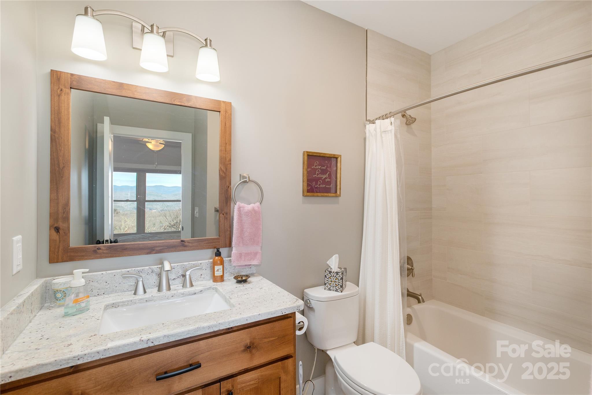69 Pepperbush Road Brevard, NC 28712 - Photo 25 of 34 a bathroom with a sink toilet tub and shower