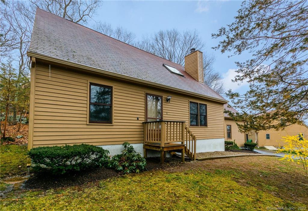 6 Copper Ridge Circle, Unit 6 Guilford, CT 06437 - Photo 1 of 1 6 Copper Ridge Circle - Set high in commanding position with pond views.