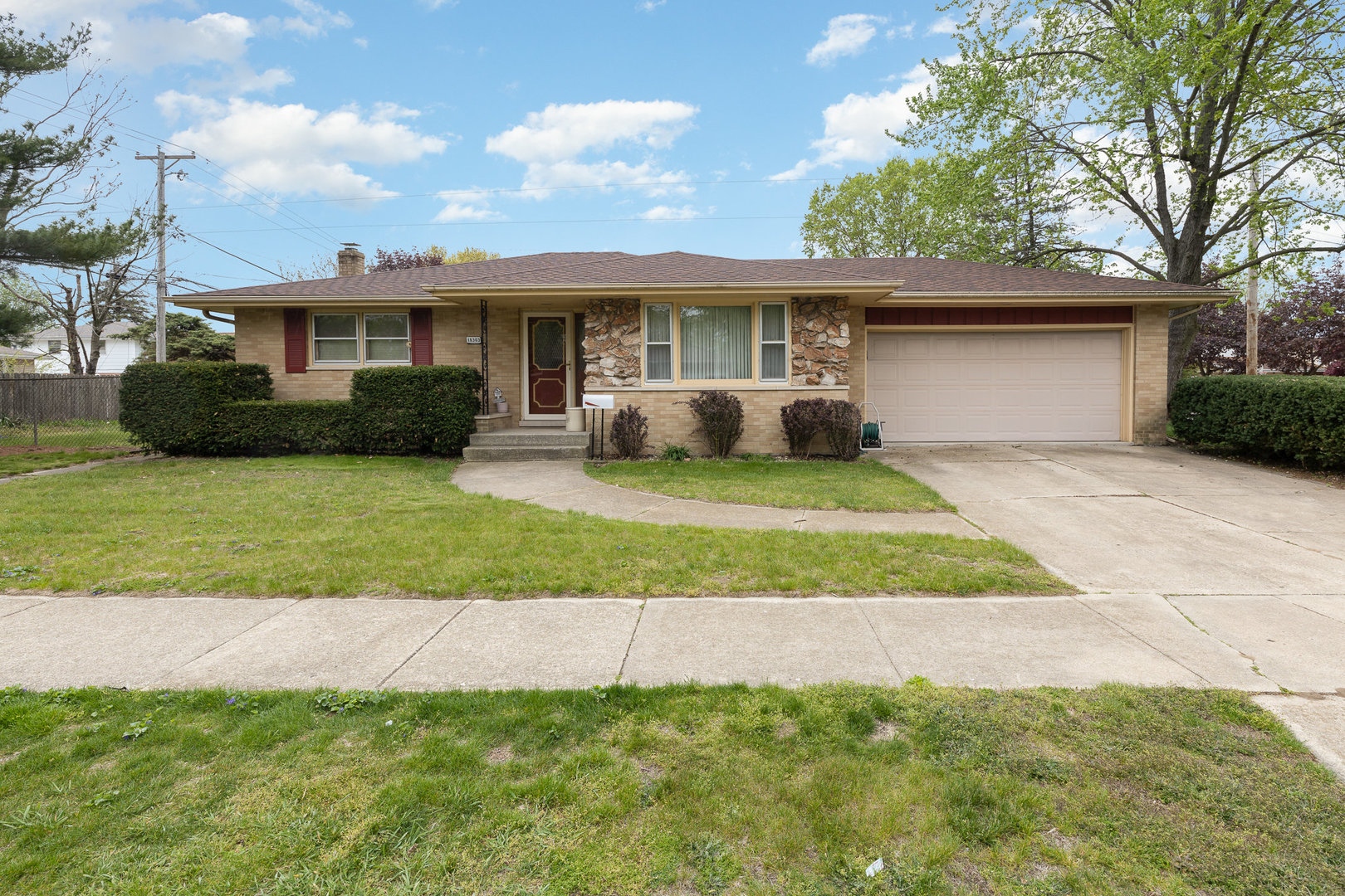 18303 Bock Road Lansing, IL 60438 - Photo 1 of 29 a view of a yard in front of a house