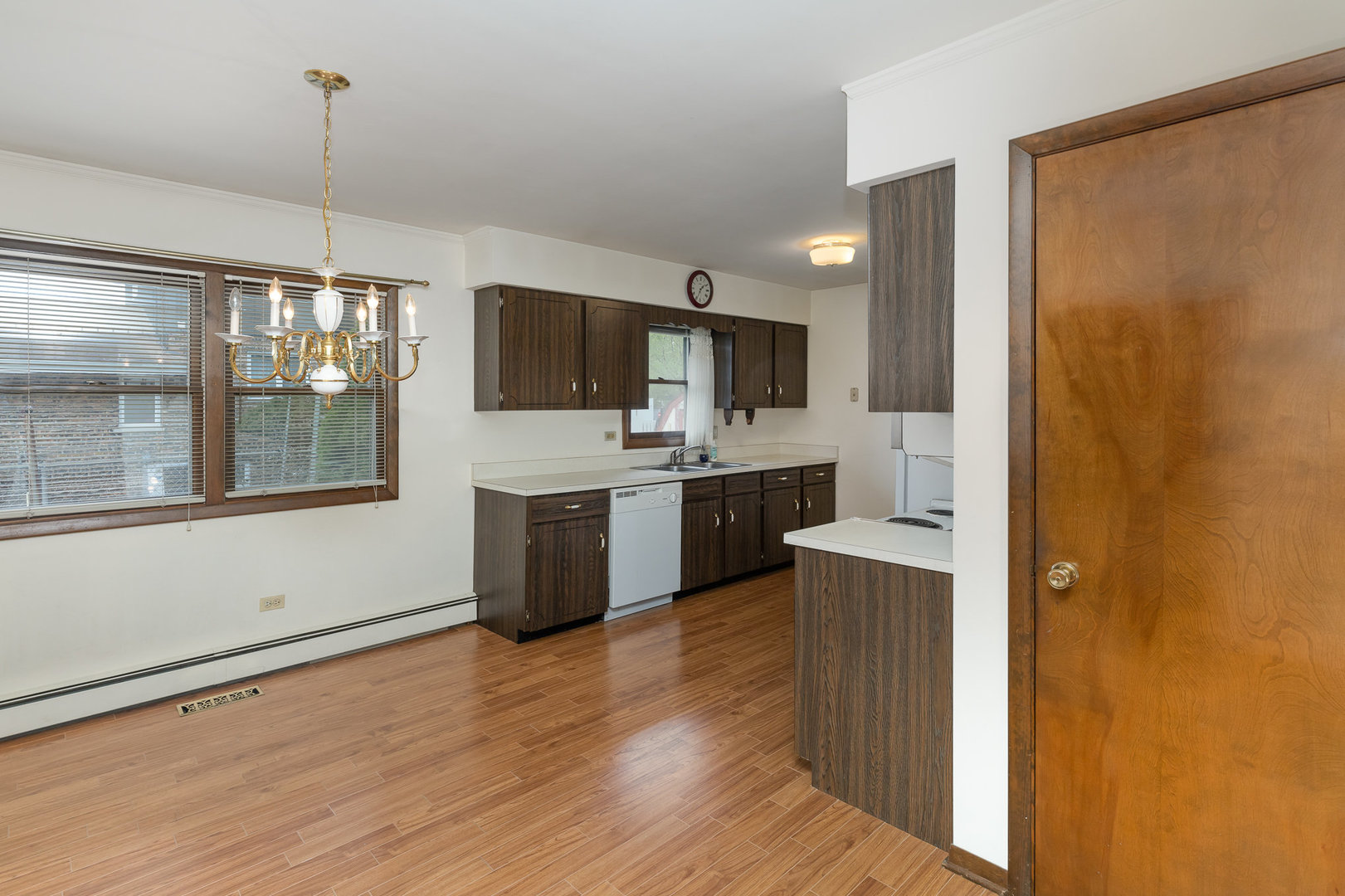 18303 Bock Road Lansing, IL 60438 - Photo 5 of 29 a kitchen with kitchen island stainless steel appliances a stove sink and microwave
