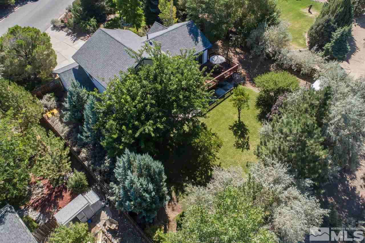 15185 Sylvester Road Reno, NV 89521 - Photo 23 of 25 an aerial view of a house with a yard and garden