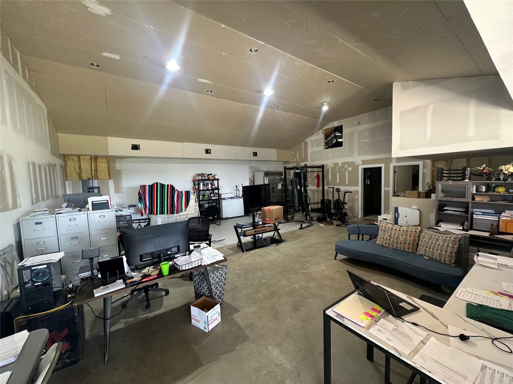 1231 Oak Grove Road Luling, TX 78648 - Photo 11 of 40 a living room with furniture and a flat screen tv