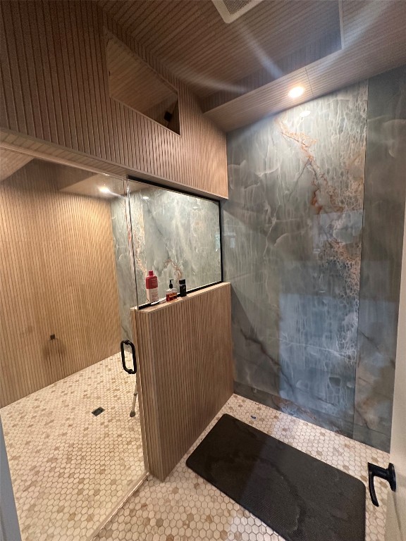 1231 Oak Grove Road Luling, TX 78648 - Photo 14 of 40 a bathroom with a bathtub and a shower