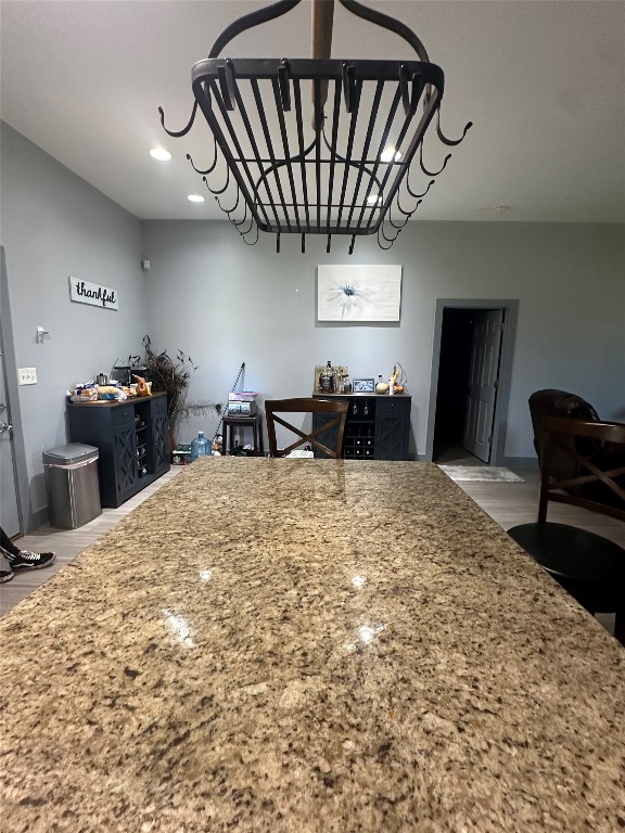 1231 Oak Grove Road Luling, TX 78648 - Photo 34 of 40 a kitchen with a stove a refrigerator and a chandelier