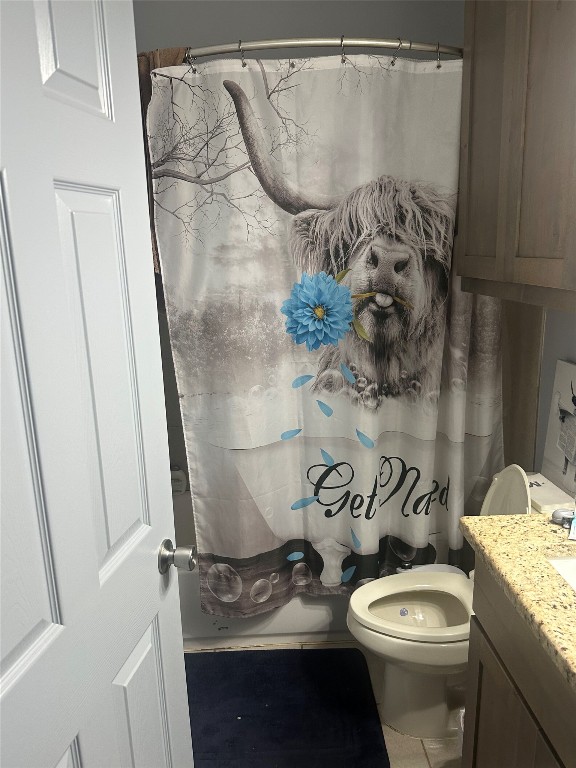 1231 Oak Grove Road Luling, TX 78648 - Photo 36 of 40 a bathroom with a granite countertop sink toilet and shower