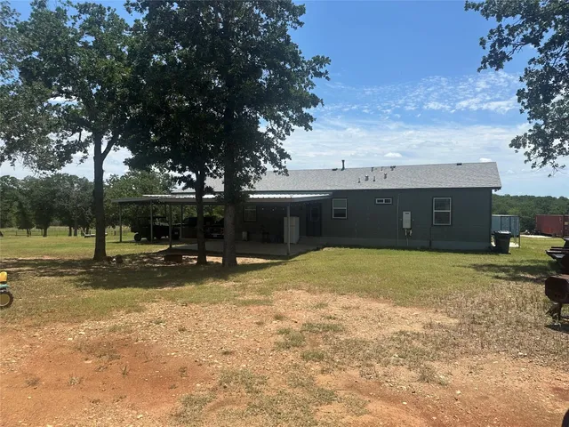 a view of a house with a patio