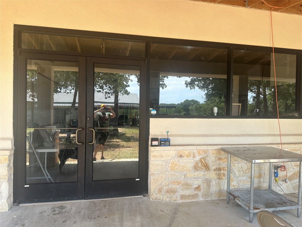 1231 Oak Grove Road Luling, TX 78648 - Photo 8 of 40 a view of a glass door with a glass door