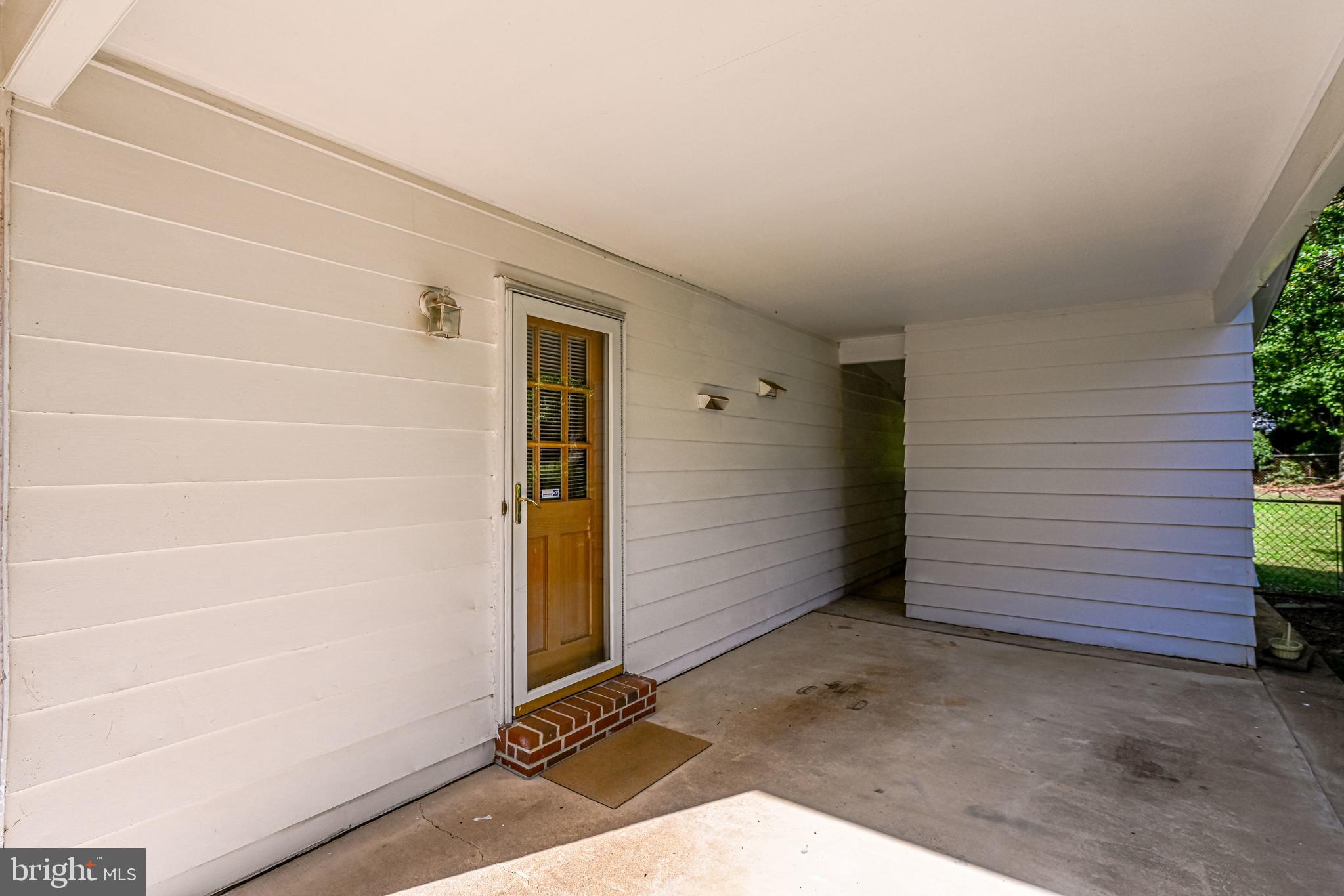 8716 Old Courthouse Road Vienna, VA 22182 - Photo 40 of 62 Covered Parking with entry to kitchen