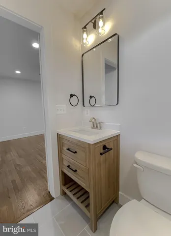 a bathroom with a toilet and a bathtub
