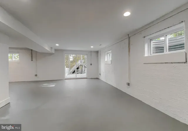a view of a balcony with wooden floor