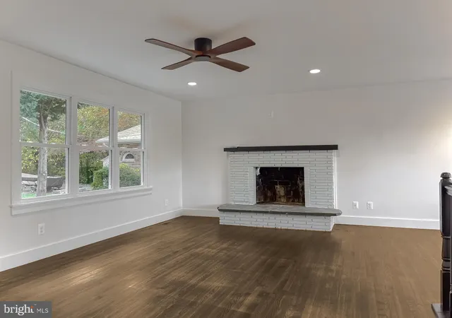 a living room with a fireplace