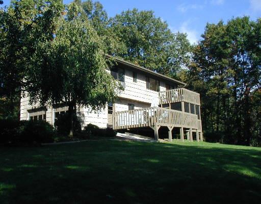 40 Dick Finn Road New Fairfield, CT 06812 - Photo 1 of 1 a front view of a house with a yard