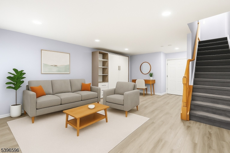 335 Wilshire Drive Nutley, NJ 07110 - Photo 15 of 23 a living room with furniture and wooden floor