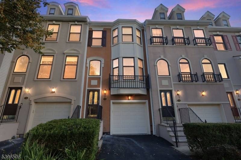 335 Wilshire Drive Nutley, NJ 07110 - Photo 19 of 23 a front view of residential houses with yard