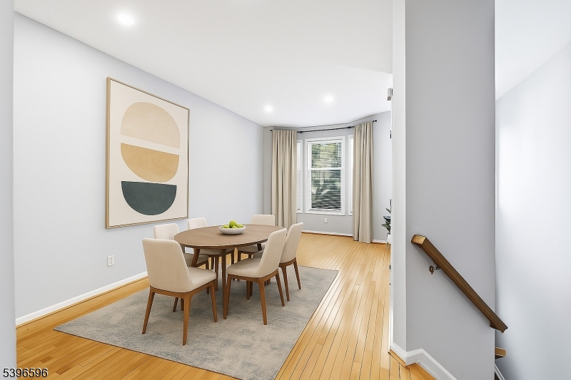 335 Wilshire Drive Nutley, NJ 07110 - Photo 2 of 23 a dining room with furniture and wooden floor