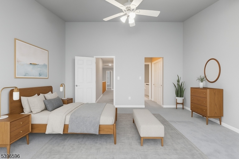 335 Wilshire Drive Nutley, NJ 07110 - Photo 8 of 23 a spacious bedroom with a bed and window