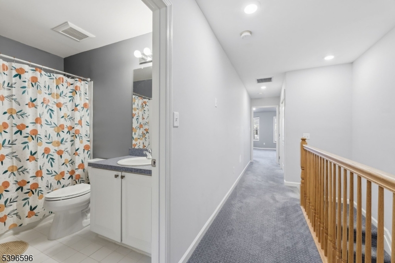 335 Wilshire Drive Nutley, NJ 07110 - Photo 10 of 23 a bathroom with a toilet and a shower