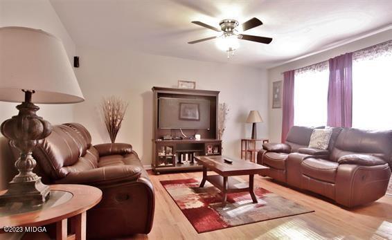 514 Ashby Way Warner Robins, GA 31088 - Photo 2 of 26 a living room with furniture a ceiling fan and a window