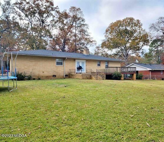 514 Ashby Way Warner Robins, GA 31088 - Photo 23 of 26 a front view of a house with a garden