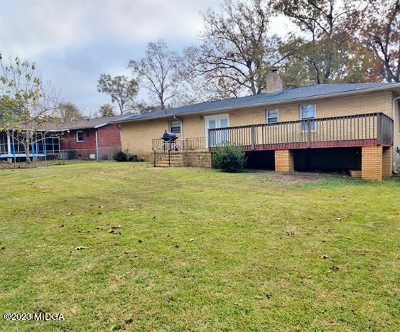 514 Ashby Way Warner Robins, GA 31088 - Photo 24 of 26 a view of a house with a yard and sitting area