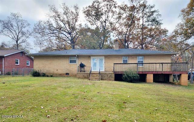 514 Ashby Way Warner Robins, GA 31088 - Photo 25 of 26 a front view of a house with a yard and garage