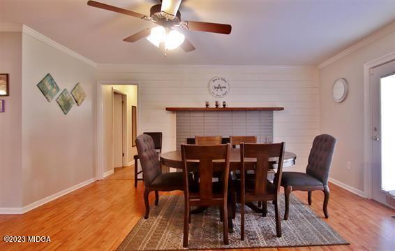 514 Ashby Way Warner Robins, GA 31088 - Photo 5 of 26 a view of a dining room with furniture and wooden floor