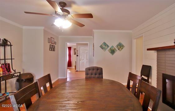 514 Ashby Way Warner Robins, GA 31088 - Photo 6 of 26 a view of a livingroom with furniture and a workspace