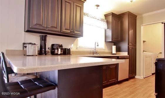 514 Ashby Way Warner Robins, GA 31088 - Photo 9 of 26 a kitchen with a sink cabinets and appliances