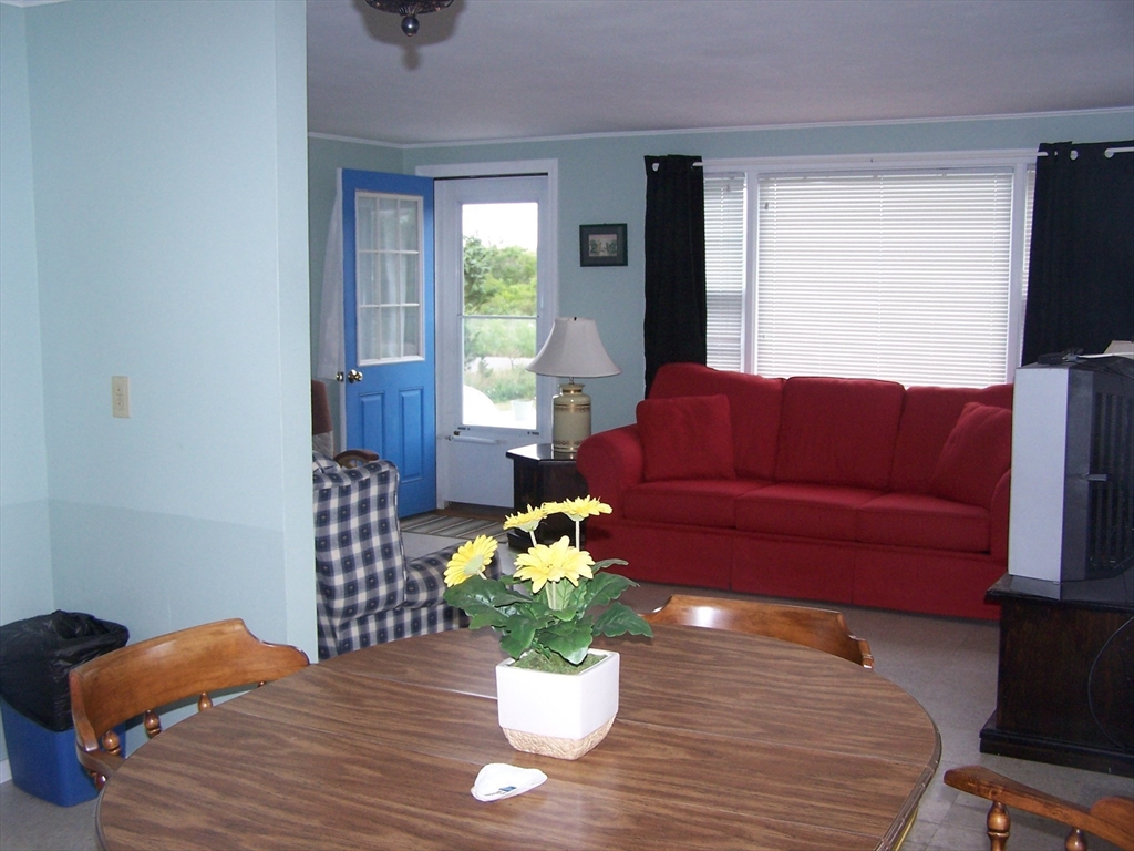 334 Phillips Sagamore Beach, MA 02562 - Photo 2 of 5 a living room with furniture flowerpot and a potted plant