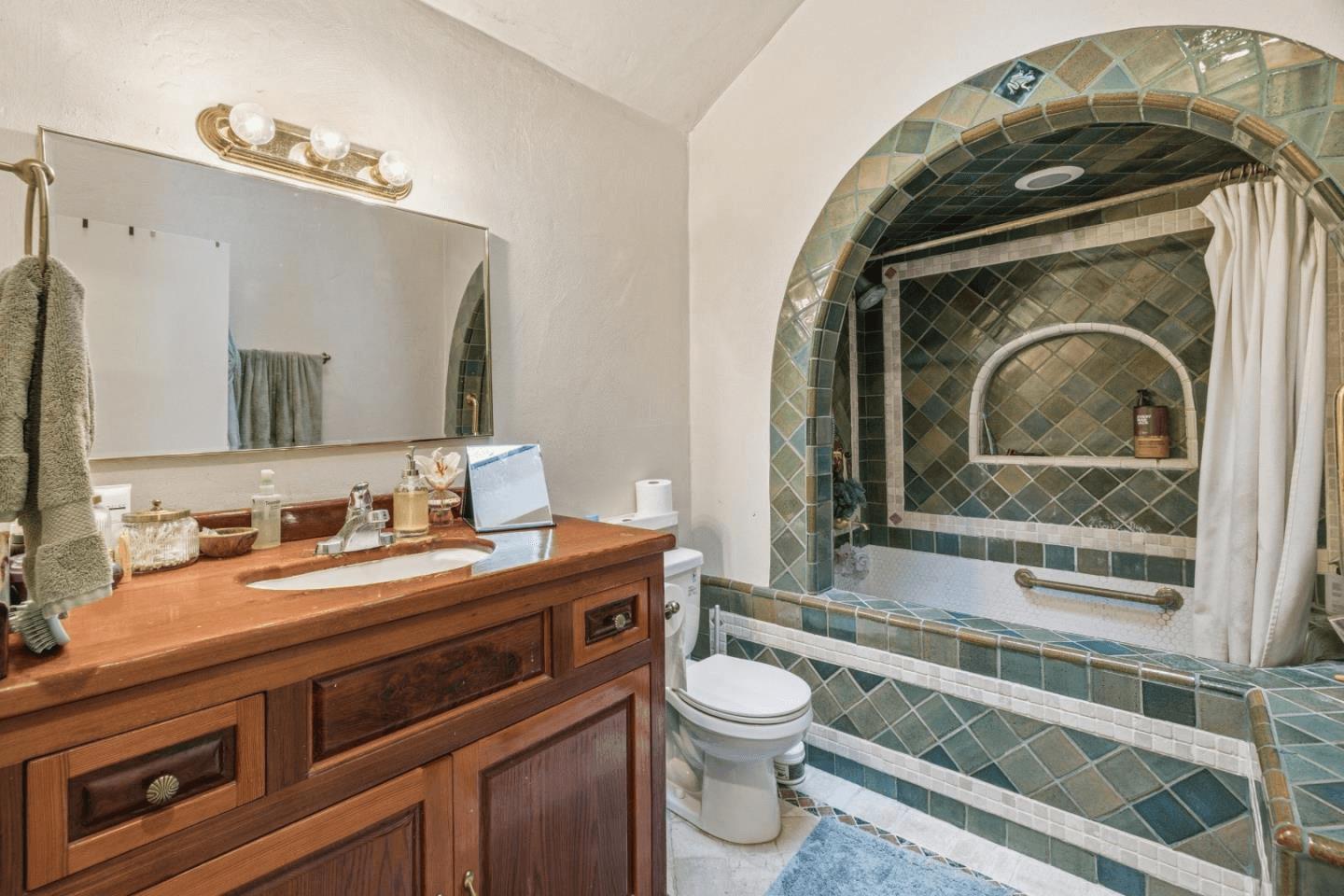 41 Back Road La Honda, CA 94020 - Photo 13 of 101 a bathroom with a toilet a sink and mirror