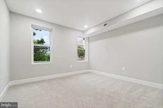 a view of a window in an empty room