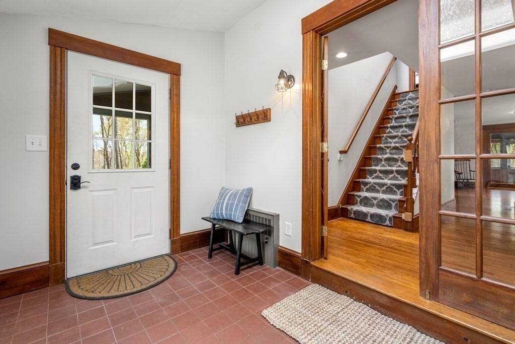 64 Larkin Road Newbury, MA 01922 - Photo 4 of 33 a view of a livingroom with furniture and staircase