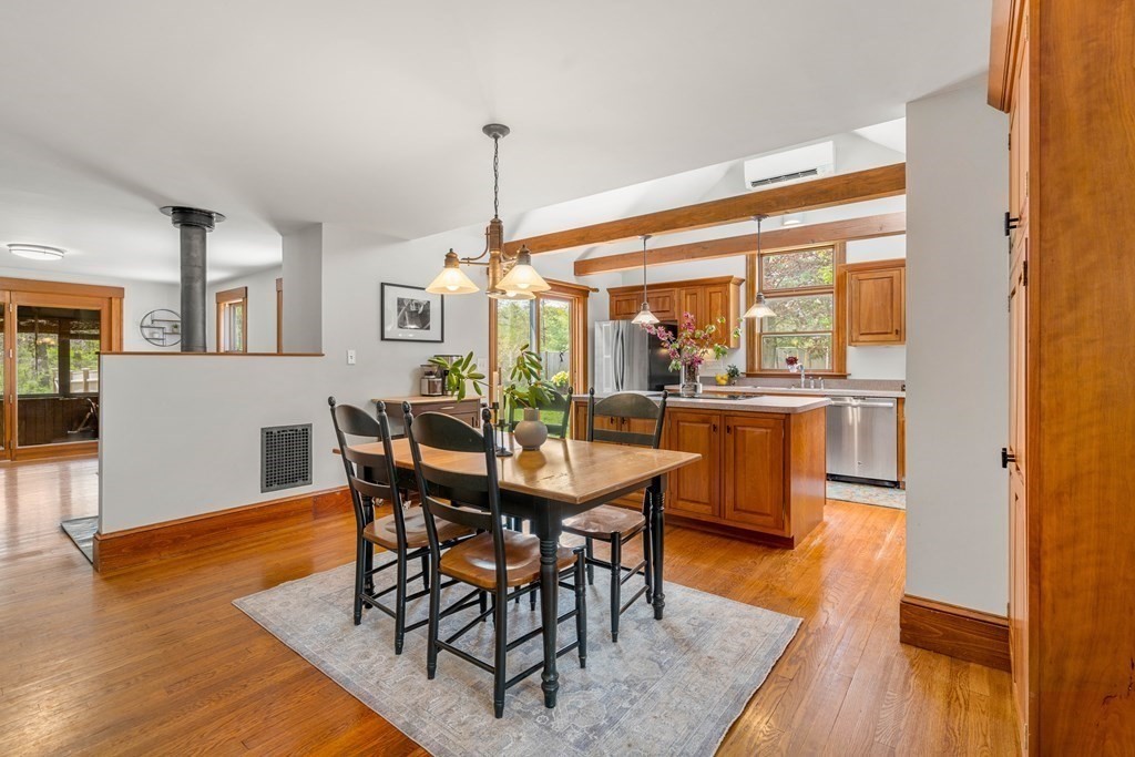 64 Larkin Road Newbury, MA 01922 - Photo 5 of 33 a view of a dining room with furniture and wooden floor
