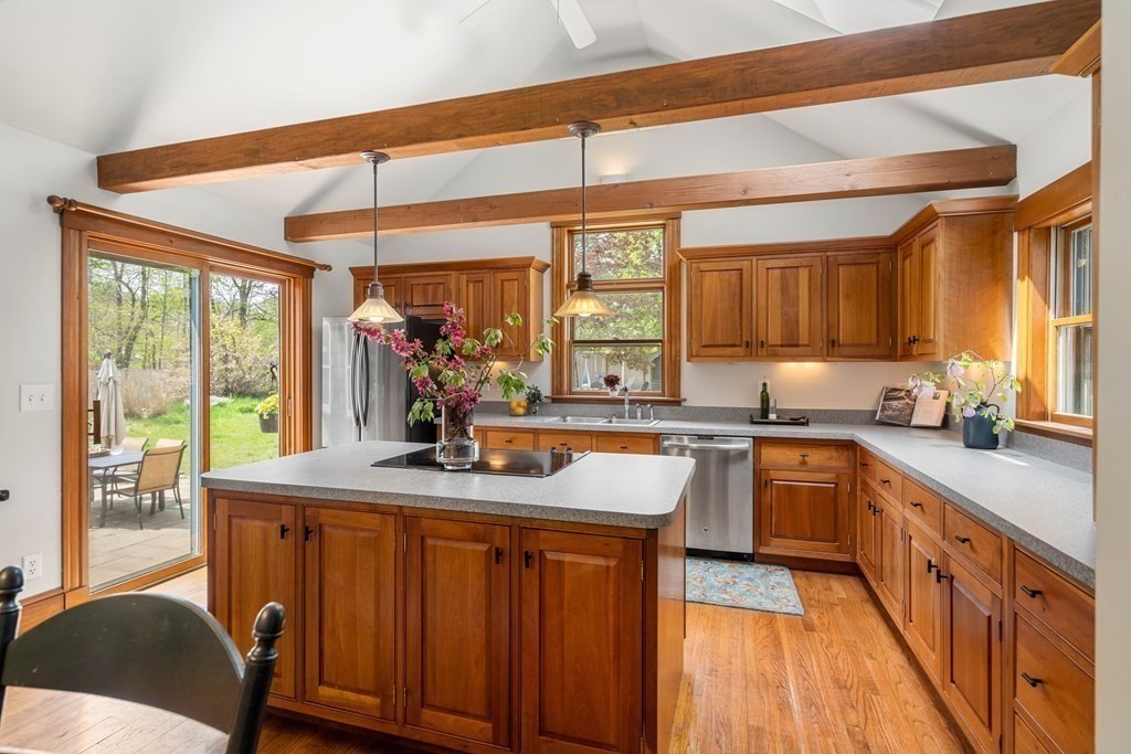 64 Larkin Road Newbury, MA 01922 - Photo 7 of 33 a kitchen with stainless steel appliances granite countertop sink stove and refrigerator