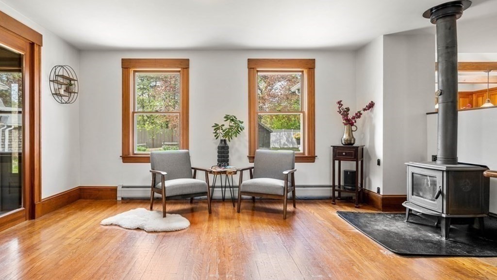 64 Larkin Road Newbury, MA 01922 - Photo 8 of 33 a living room with furniture and a wooden floor