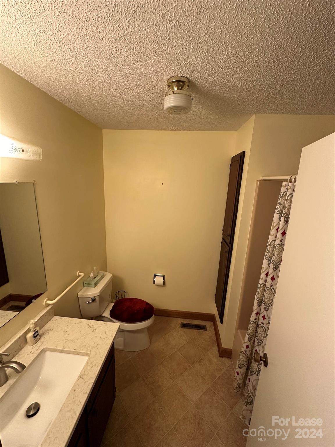 147 Sinclair Road Mooresville, NC 28115 - Photo 15 of 21 a bathroom with a sink and a mirror