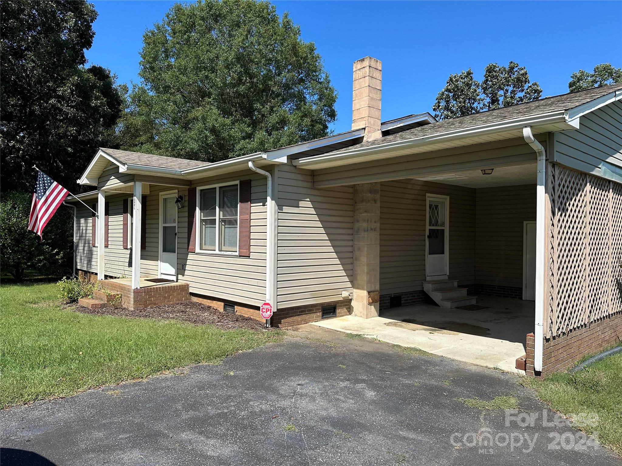 147 Sinclair Road Mooresville, NC 28115 - Photo 17 of 21 a view of a house with a yard