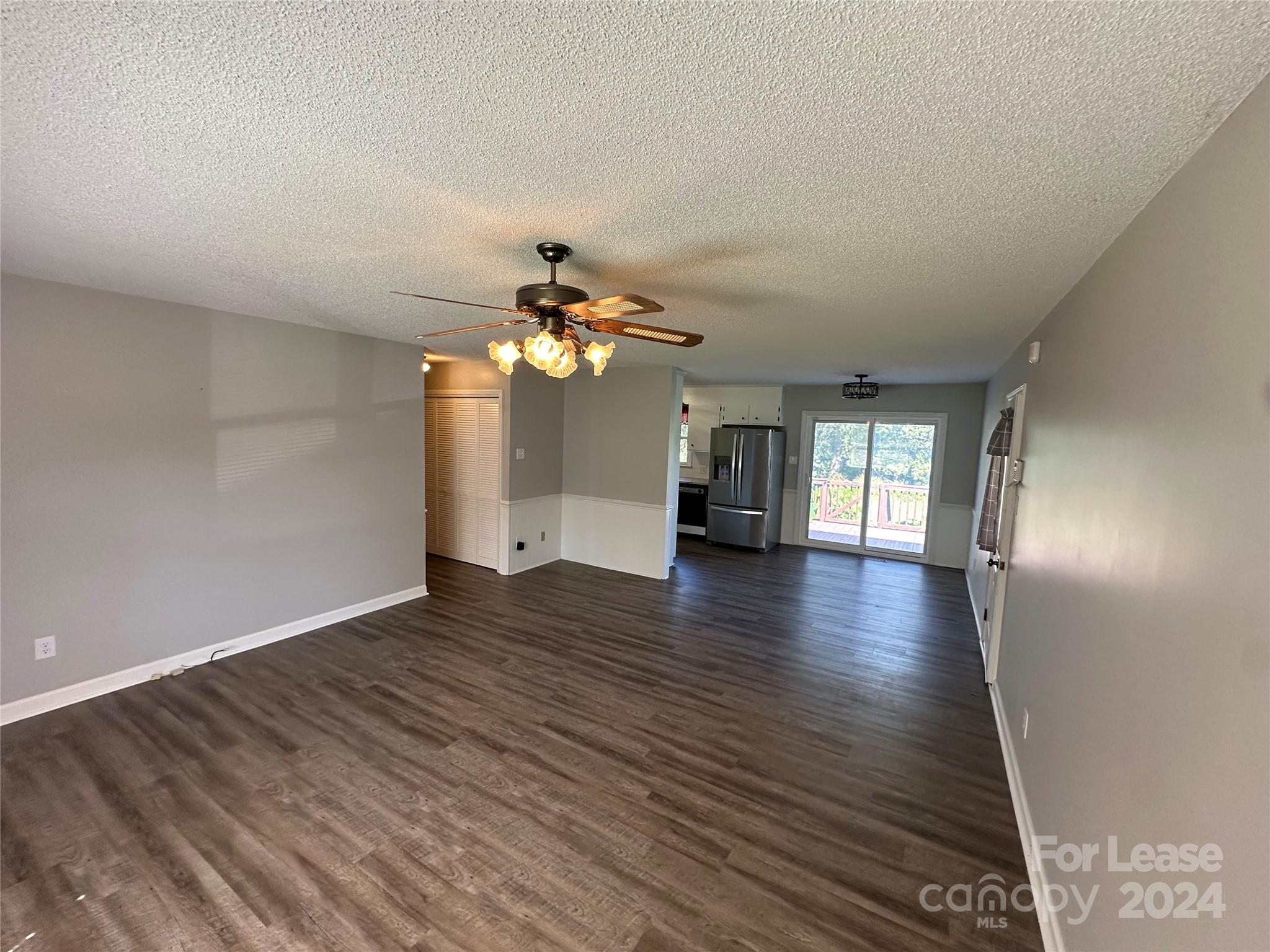 147 Sinclair Road Mooresville, NC 28115 - Photo 6 of 21 a view of a livingroom with a chandelier