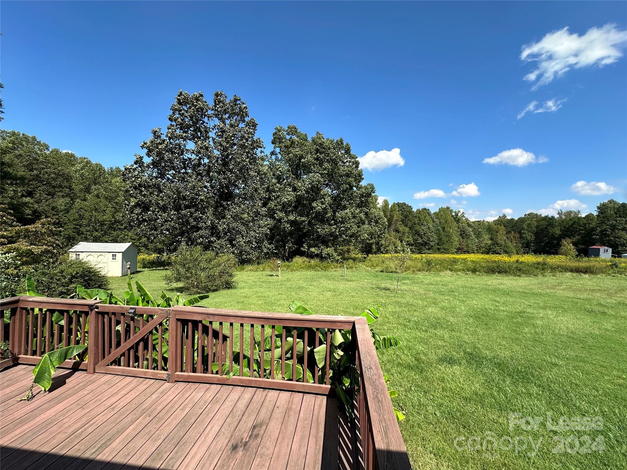 147 Sinclair Road Mooresville, NC 28115 - Photo 7 of 21 a view of a balcony with two chairs