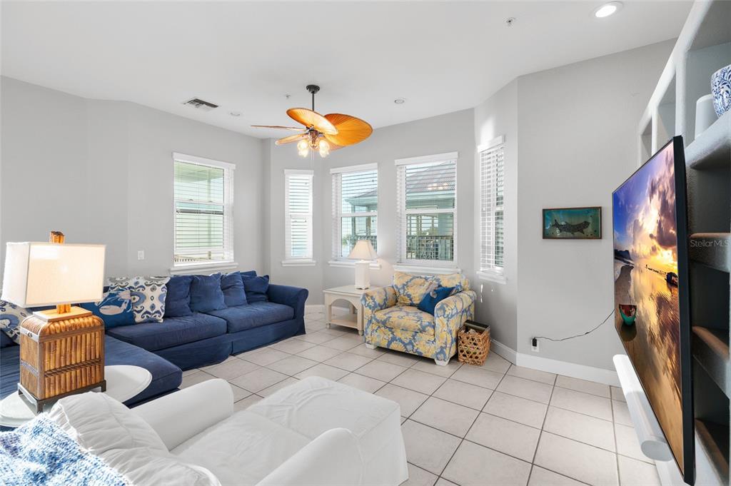 8798 Grand Avenue Boca Grande, FL 33921 - Photo 15 of 64 a living room with furniture and a large window
